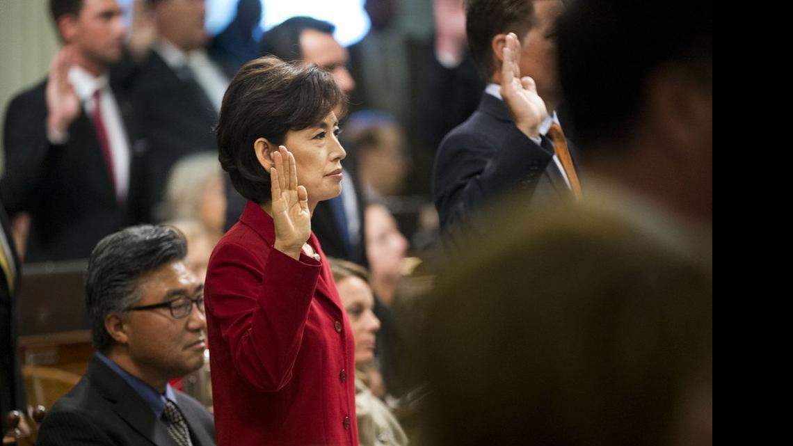 
Assemblywoman Young Kim, R-Fullerton, is sworn in on Dec. 1 at the state Capitol in Sacramento. Her family left South Korea when she was a girl, and now Kim is California’s first Korean American legislator, representing northern Orange County.
