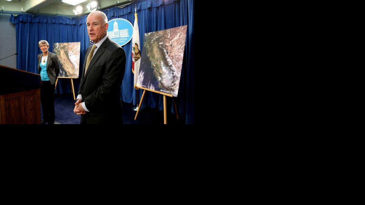 
Gov. Jerry Brown responds to a question concerning the announcement by U.S. Secretary of the Interior Sally Jewell, left, that the federal government is offering up to $50 million for drought relief in western states during a news conference at the Capitol in Sacramento, Calif., Friday, Feb. 6, 2015.
