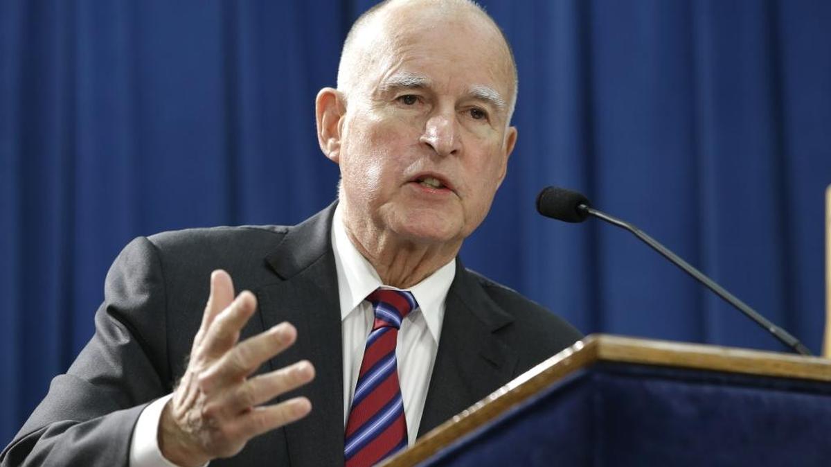 In this Jan. 7, 2016 file photo, Gov. Jerry Brown answers a question concerning his proposed 2016-17 state budget at a news conference, in Sacramento, Calif. 