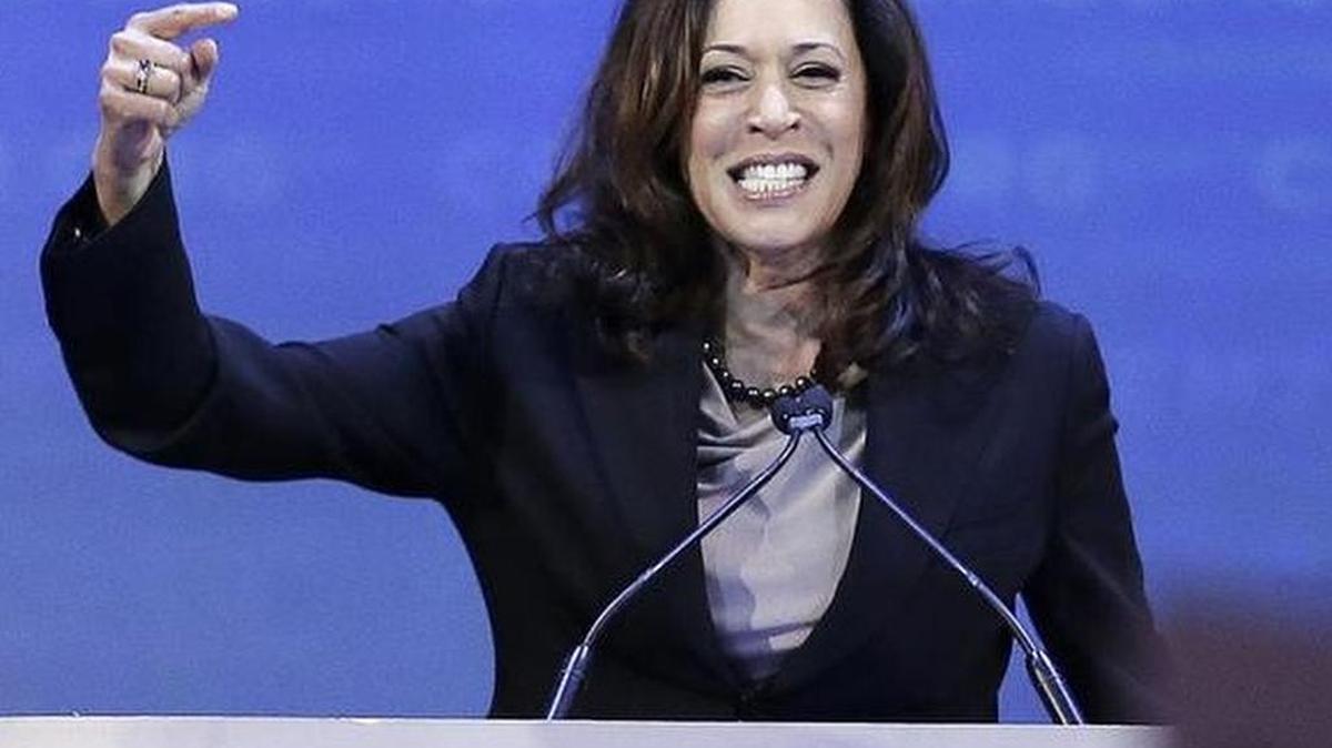 California Attorney General Kamala Harris gestures while speaking before the California Democrats State Convention Saturday, Feb. 27, 2016, in San Jose, Calif.