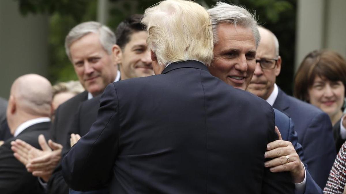 Kevin McCarthy hugs Donald Trump in the Rose Garden of the White House in 2017. (AP Photo/Evan Vucci)