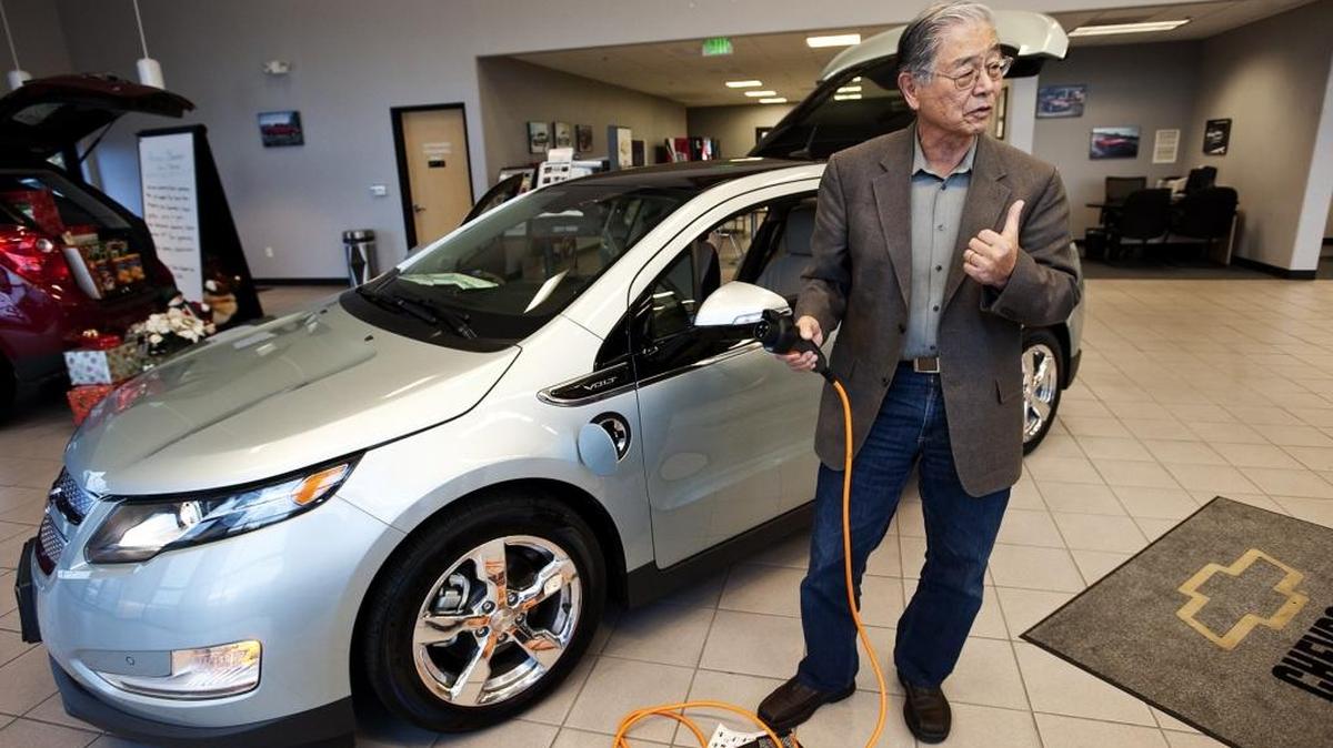 UC Davis professor and longtime green-car advocate Andy Frank talks to the media about his new Chevrolet Volt plug in hybrid car he leased at Hanlees Chevrolet in Davis Tuesday December 21, 2010.