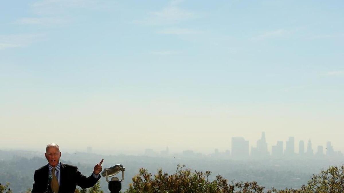 California Gov. Jerry Brown speaks before signing into law Senate Bill 350, legislation aimed at renewable energy, on Wednesday, Oct. 7, 2015, at the Griffith Observatory in Los Angeles.