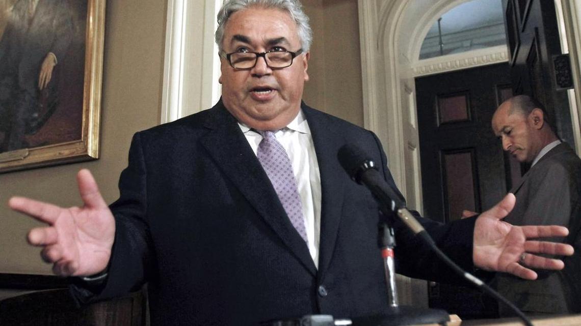 Prosecutors will seek a prison term of no more than 70 months for former State Sen. Ron Calderon, D-Montebello, shown discussing an FBI raid on his Capitol office in 2013. Calderon agreed to a plea bargain on corruption charges.