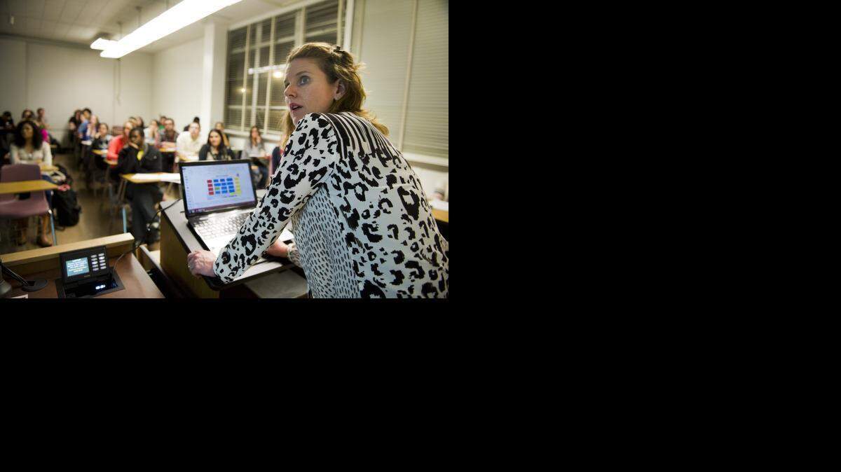 
Dr. Sarah Strand, a part-time lecturer with a full-time day job, teaches a psychology course at Sacramento State on Jan. 28, 2014.
