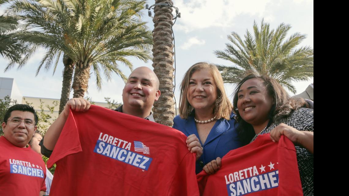 
Rep. Loretta Sanchez, second from right, poses with supporters at the California Democratic Convention in Anaheim on Saturday. The party’s Native American Caucus denounced Sanchez’s caricature of an Indian “war cry” on Monday, calling the gesture she made over the weekend insensitive and insulting.
