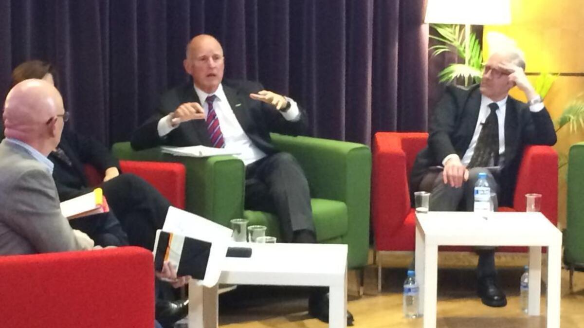 Gov. Jerry Brown speaks at a university in Paris on Dec. 9, 2015.