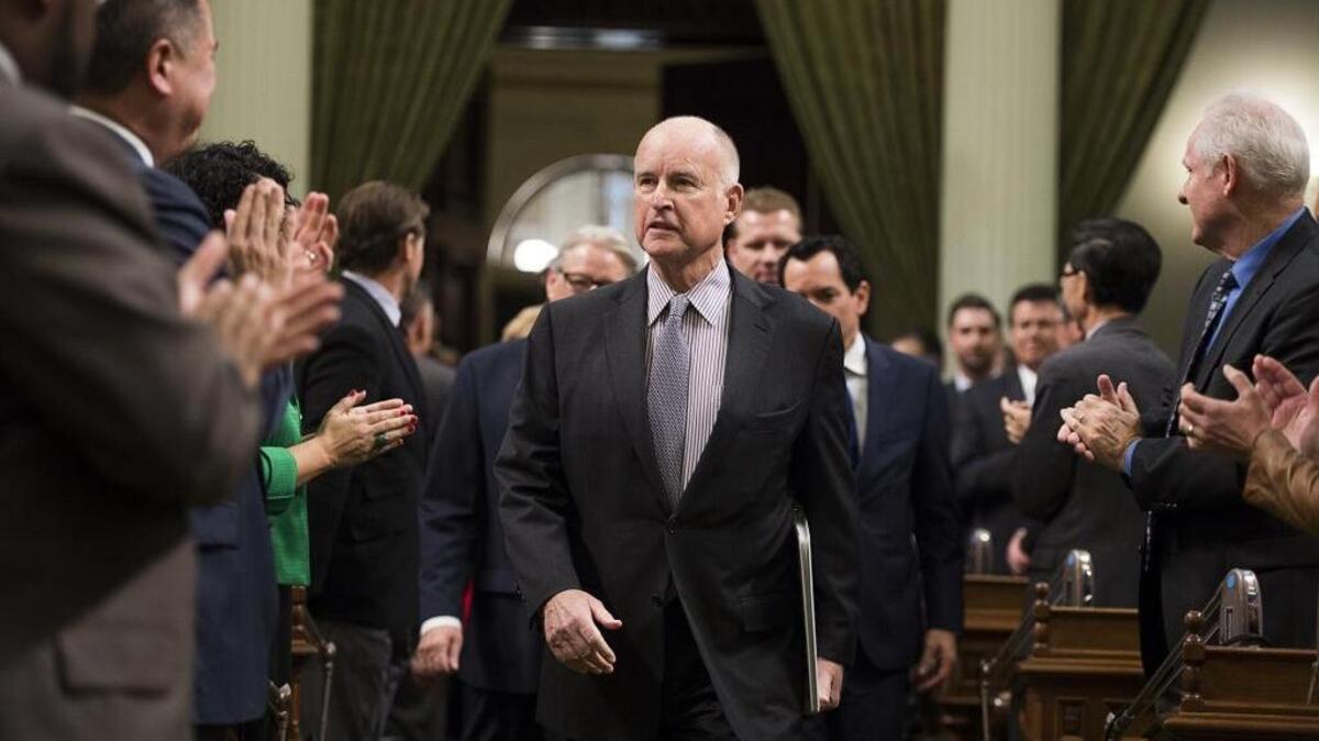 Gov. Jerry Brown arrives for the State of the State in the Assembly Chamber at the State Capitol on Thursday January 21, 2016.