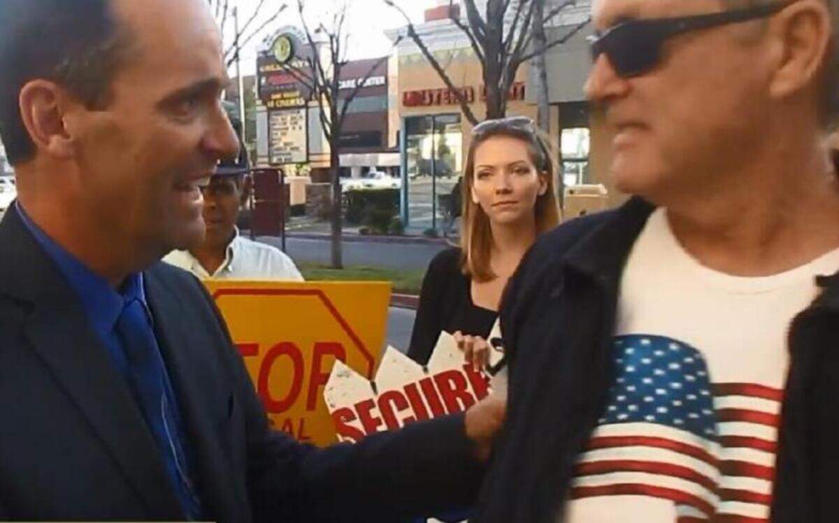 
Rep. Steve Knight, R-Lancaster, left, confronts a protester in Simi Valley.
