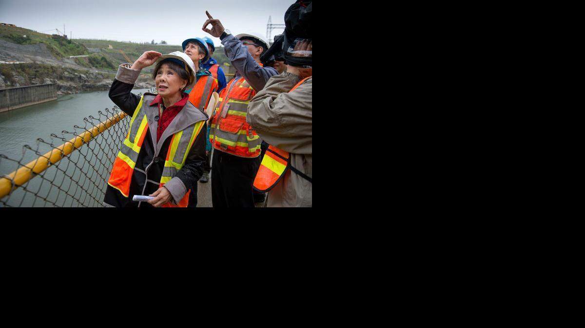 
Rep. Doris Matsui and Secretary of the Interior Sally Jewell look at work being done at the Folsom dam as Jay Emami with the Bureau of Reclamation gives them a tour of the construction Friday.

