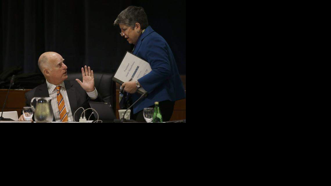 
Gov. Jerry Brown, left, greets University of California President Janet Napolitano during a UC Board of Regents meeting Wednesday in San Francisco.
