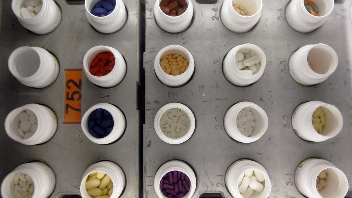 
In this June 14, 2011 file photo, various prescription drugs move along the automated pharmacy assembly line at Medco Health Solutions in Willingboro, N.J. A California campaign committee of an industry trade group reported more than $10 million in donations to oppose a possible ballot measure to limit drug prices.
