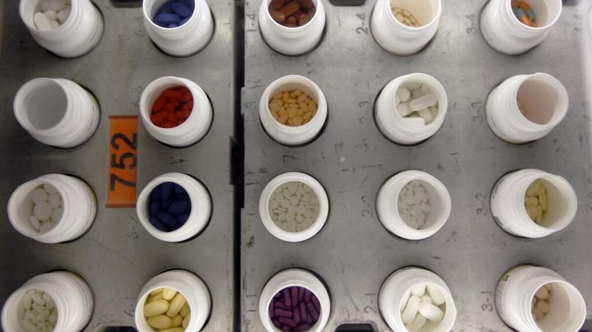 
In this June 14, 2011 file photo, various prescription drugs move along the automated pharmacy assembly line at Medco Health Solutions in Willingboro, N.J. A California campaign committee of an industry trade group reported more than $10 million in donations to oppose a possible ballot measure to limit drug prices.
