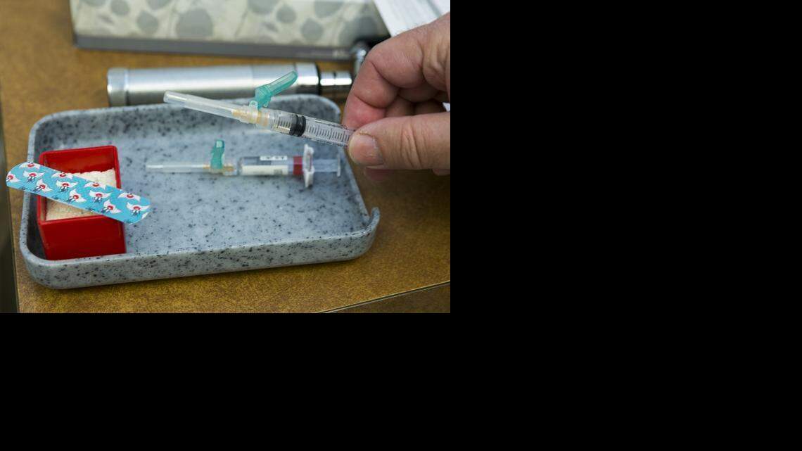 
In this Thursday, Jan. 29, 2015, photo, a single-dose of the measles-mumps-rubella virus vaccine live, or MMR vaccine is ready in Northridge, Calif. 
