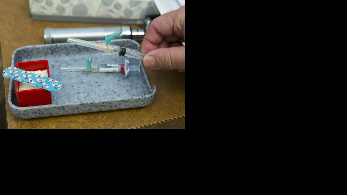 
In this Thursday, Jan. 29, 2015, photo, a single-dose of the measles-mumps-rubella virus vaccine live, or MMR vaccine is ready in Northridge, Calif. 
