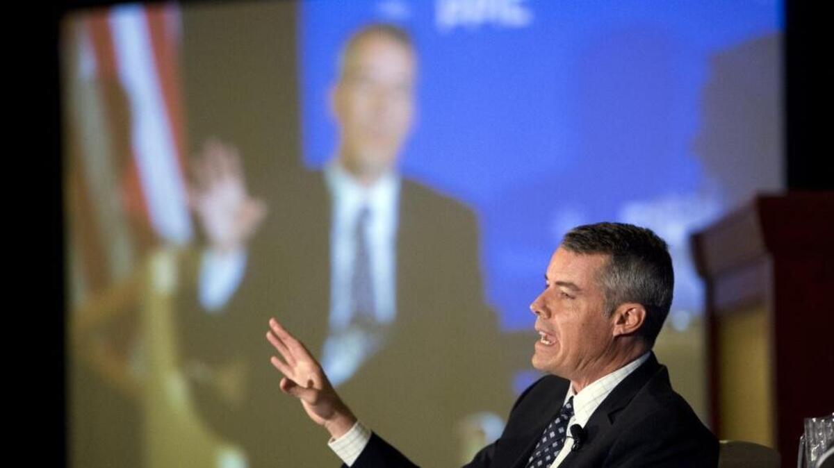 Pete Peterson, then a candidate for Secretary of State, speaks with Democratic Sen. Alex Padilla during a debate presented by The Public Policy Institute of California on September 11, 2014 in Sacramento.