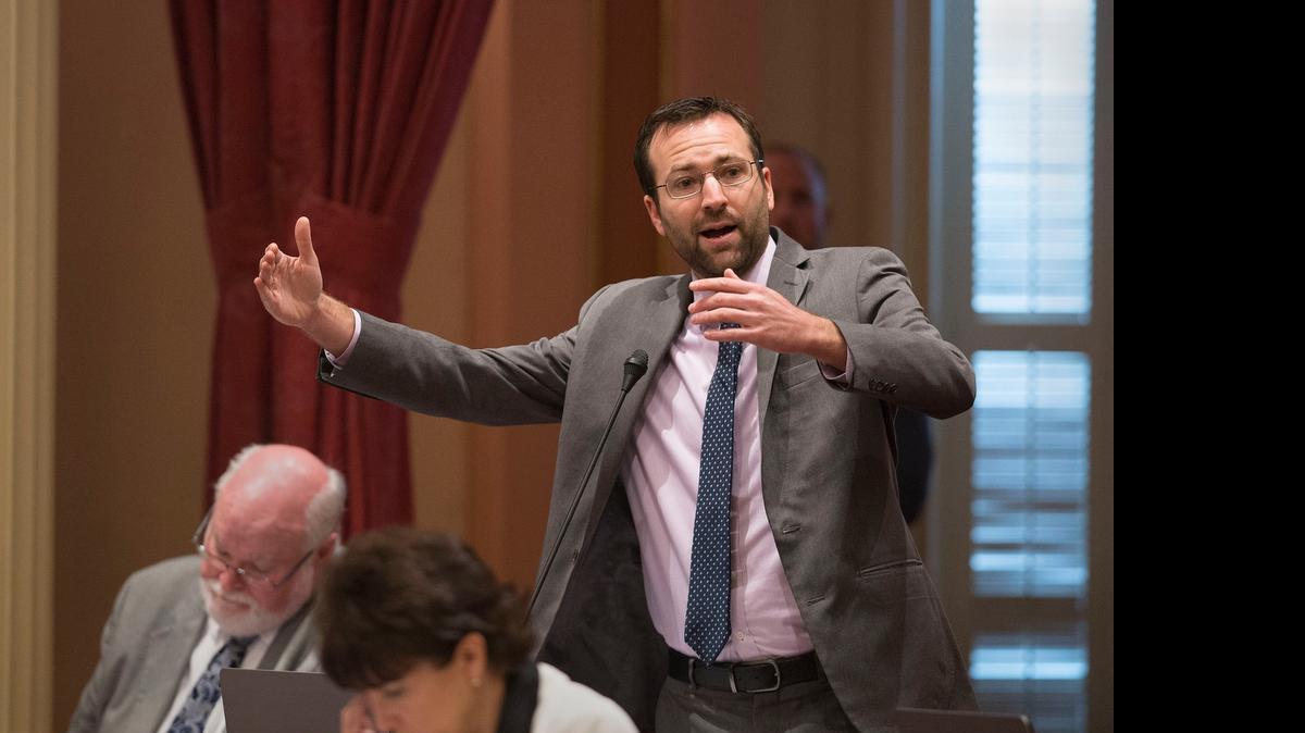
State Sen. Ben Allen, D-Santa Monica, discusses SB 277, which he co-authored, at the state Capitol on Thursday. The measure requiring California schoolchildren to get vaccinated was approved 25-10 and is headed to the Assembly.
