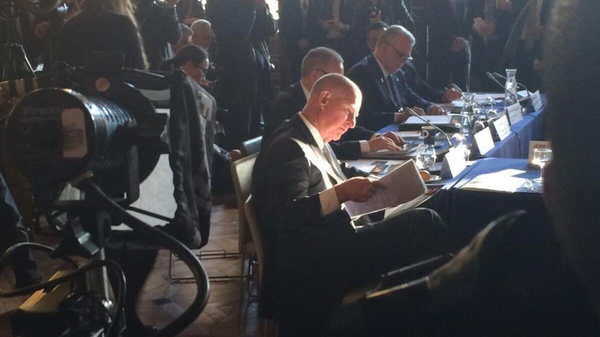 Gov. Jerry Brown attends a meeting with leaders of other jurisdictions at Paris’ city hall on Dec. 7, 2015.