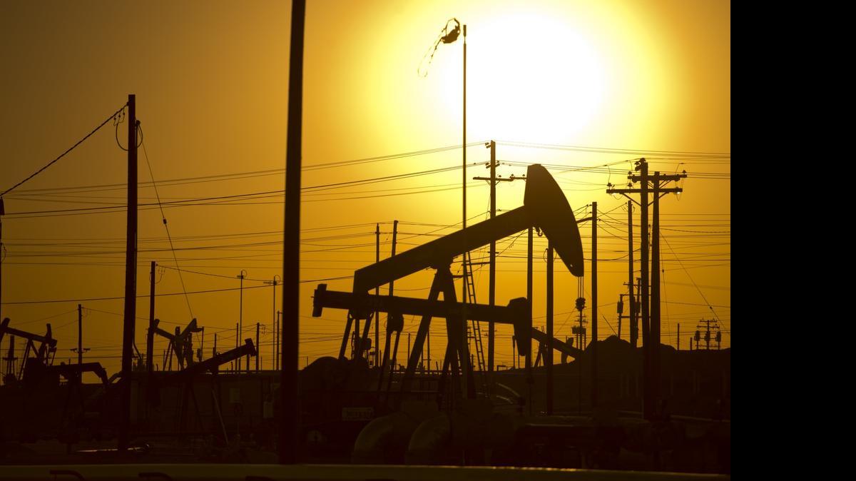 
Operating oil derricks in the Kern River Oil Field near Bakersfield. Oil was discovered at the Kern River Oil Field in 1899 and has been in production and part of the area's culture in around Bakersfield ever since, but the city has the nation’s second highest rate of “youth disconnection.”
