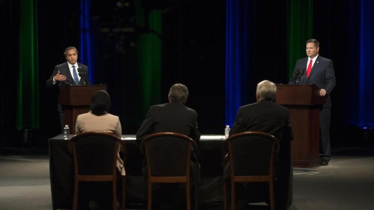 Rep. Ami Bera, D-Elk Grove, and his Republican challenger, Sacramento County Sheriff Scott Jones, participate in a debate for the highly competitive 7th Congressional District seat at the KVIE television studios in Sacramento on Oct. 18, 2016.