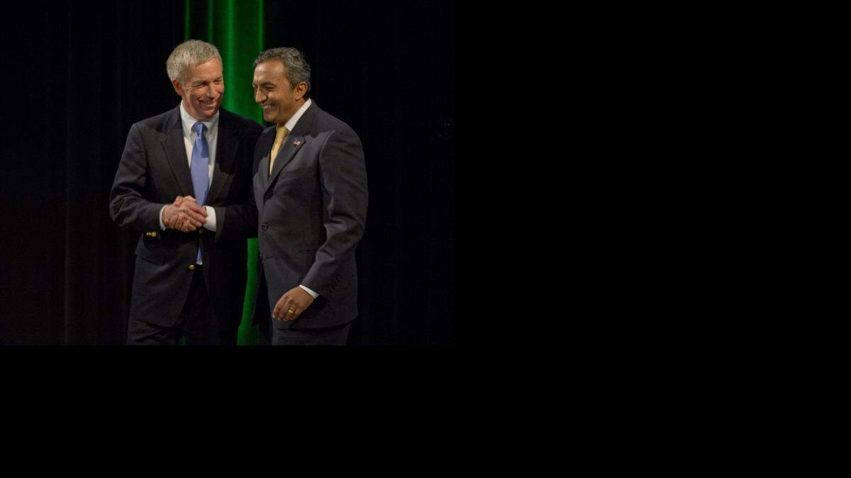 
Democratic Rep. Ami Bera, right, and Republican Doug Ose shake hands after debating at the KVIE Studio's on Oct. 8, 2014, in Sacramento.
