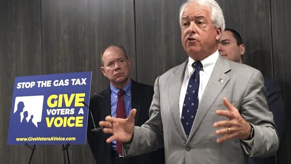 California Republican gubernatorial candidate John Cox, right, speaks in Sacramento on Oct. 18, 2017, about his decision to spend “significant” money on an effort to repeal California's newly passed gas and diesel tax increase. Cox is joined by Jon Coupal, president of the Howard Jarvis Taxpayers Association, at left.