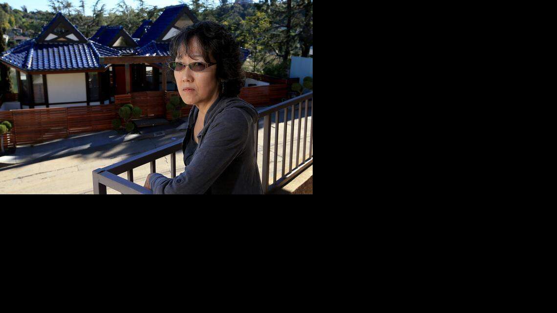
Jane Taguchi, shown in January, was upset that the house across the street from her was being rented out regularly on Airbnb, even though short-term rentals are barred in her Silver Lake neighborhood of Los Angeles.
