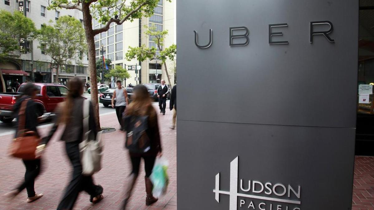 
Foot traffic streams past Ube’s offices on Market Street in San Francisco.
