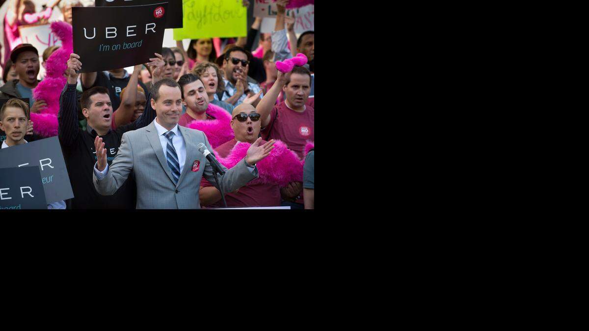 
Robert Callahan, California executive director of The Internet Association, speaks during a rally at the state Capitol last year pressing for legislation on ridesharing. A state law was enacted treating Uber and Lyft like taxis.
