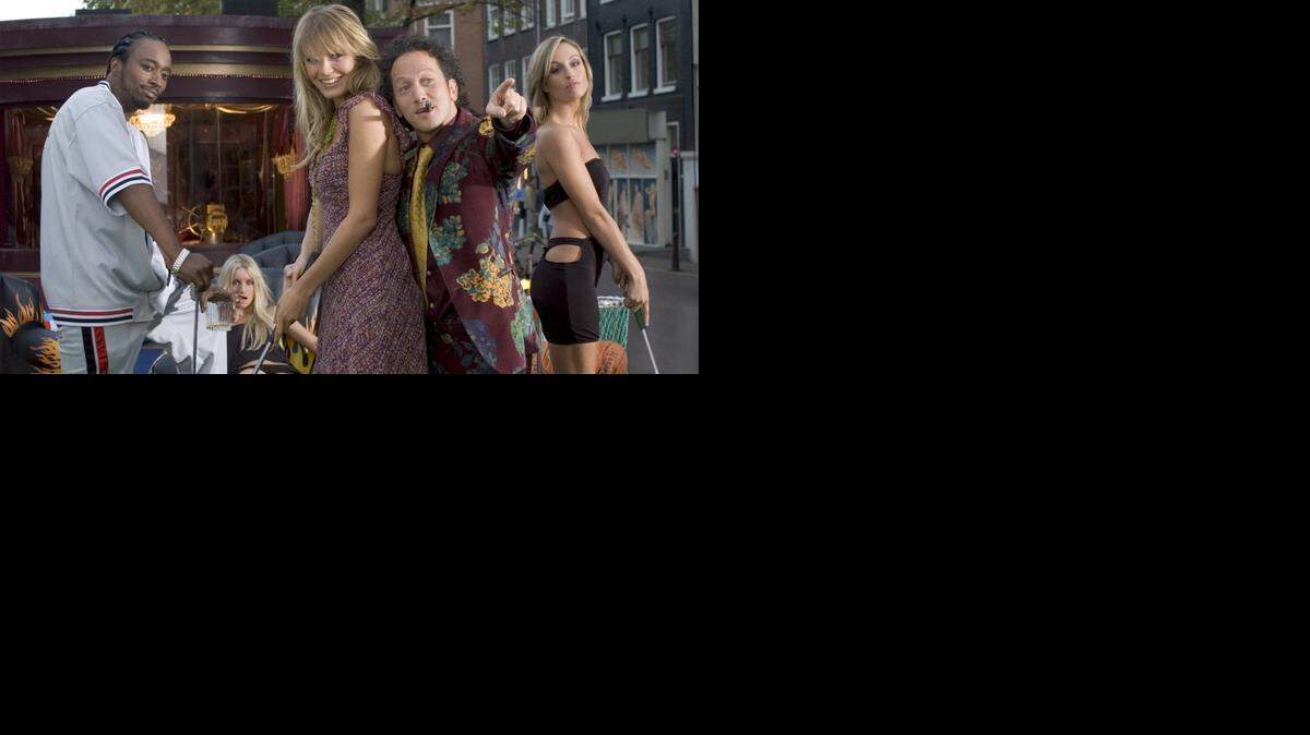 
Rob Schneider (second from right) poses with other actors in this 2005 promotional photo for Deuce Bigalow: European Gigolo.
