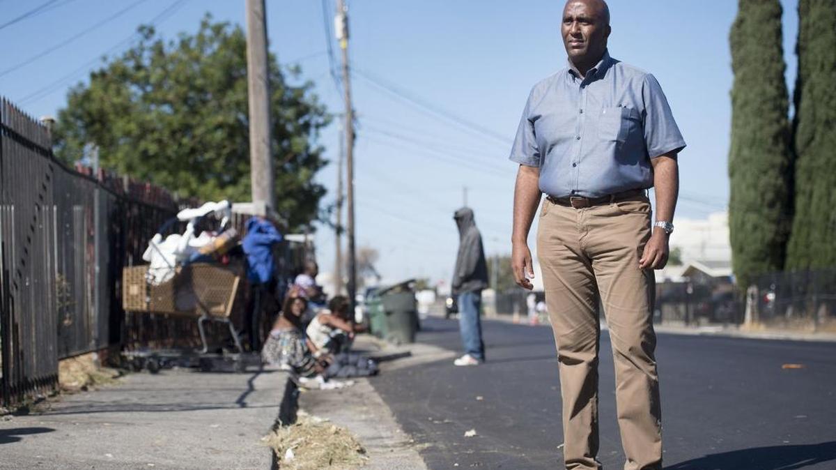 Assemblyman Jim Cooper, a former Sacramento County Sheriff’s deputy, stands on a street near 47th Avenue in south Sacramento on Sept. 22, 2015. Cooper responded to many calls in the area throughout his career.