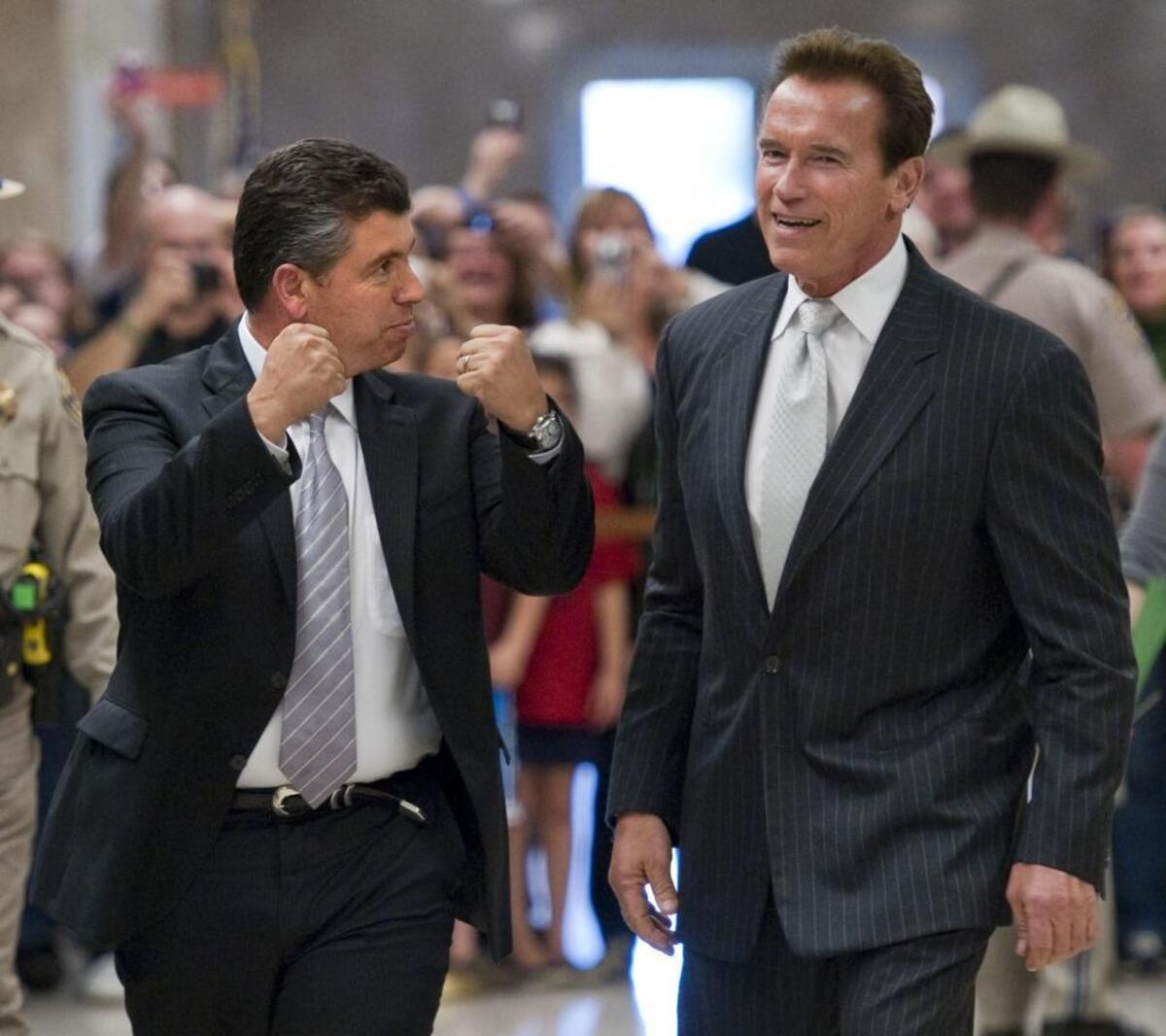 Then-State Sen. Abel Maldonado, R-Santa Maria, and Gov. Arnold Schwarzenegger head to a press conference in 2010. Maldonado was a driving force behind the creation of California’s top-two primary system.