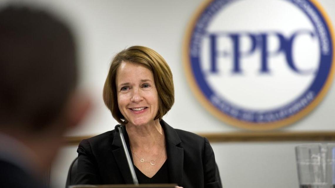 
Jodi Remke leads an FPPC meeting in 2014. The commission adopted rules Thursday designed to deter coordination between candidates’ campaigns and outside spending committees.
