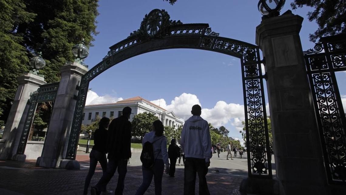Students walk through Sather Gate at UC Berkeley.