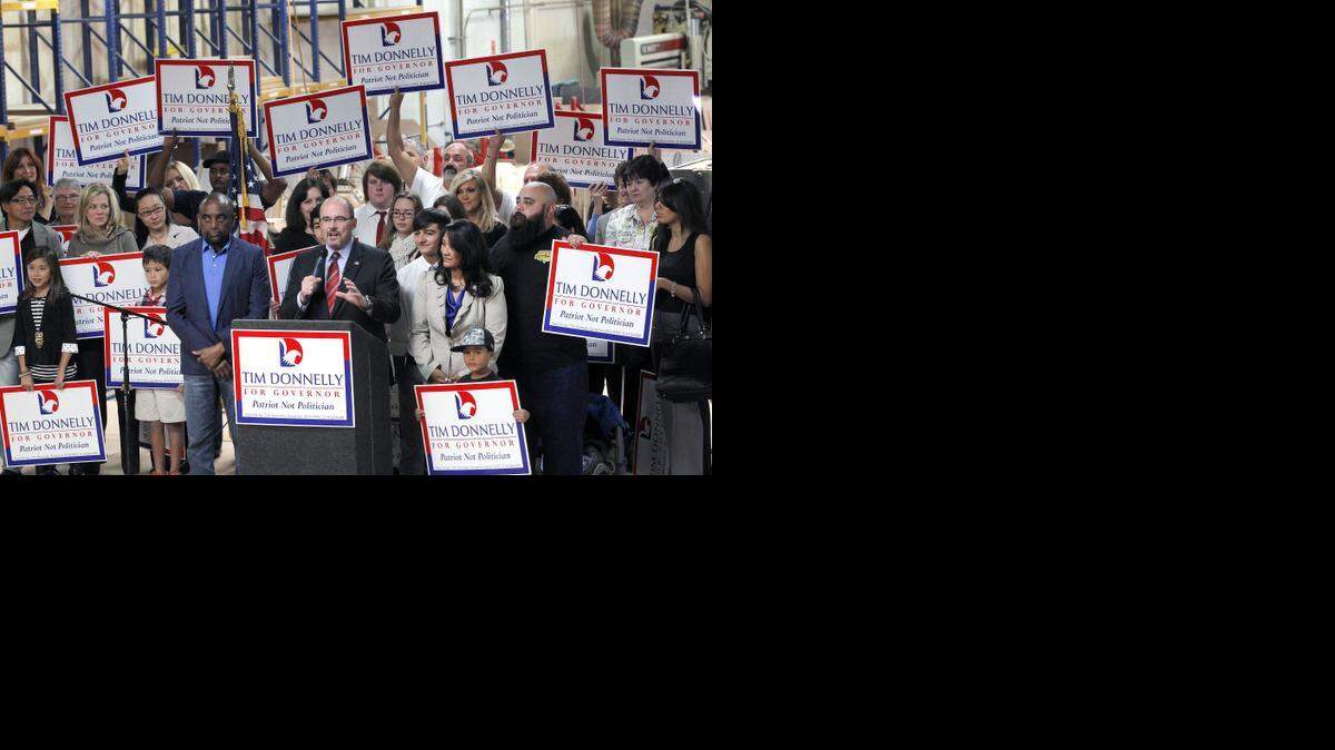 
Assemblyman Tim Donnelly, R-Twin Peaks, announces he's running for governor at the Darafeev Furniture Factory in Baldwin Park on Nov. 5, 2013.
