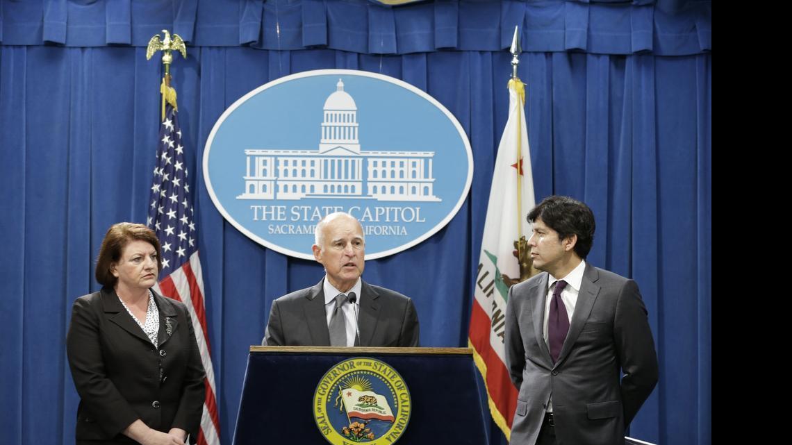 
Gov. Jerry Brown discusses the compromise budget he reached with Assembly Speaker Toni Atkins, D-San Diego, left, and Senate President Pro Tem Kevin de Leon, D-Los Angeles, at a Capitol news conference June 16, 2015. New state data suggests the state will collect more in income tax and corporate tax revenue for 2014-15 than the plan estimated.
