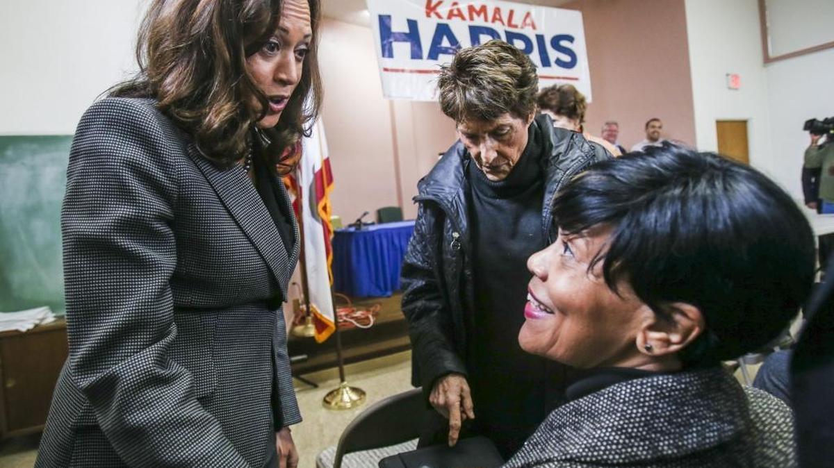 California Attorney General Kamala Harris, left, greets Sharon Brown, right, and Dorothy Reik as she arrives for a meet-and-greet event Sunday at the Building and Construction Trades Council in Los Angeles.
