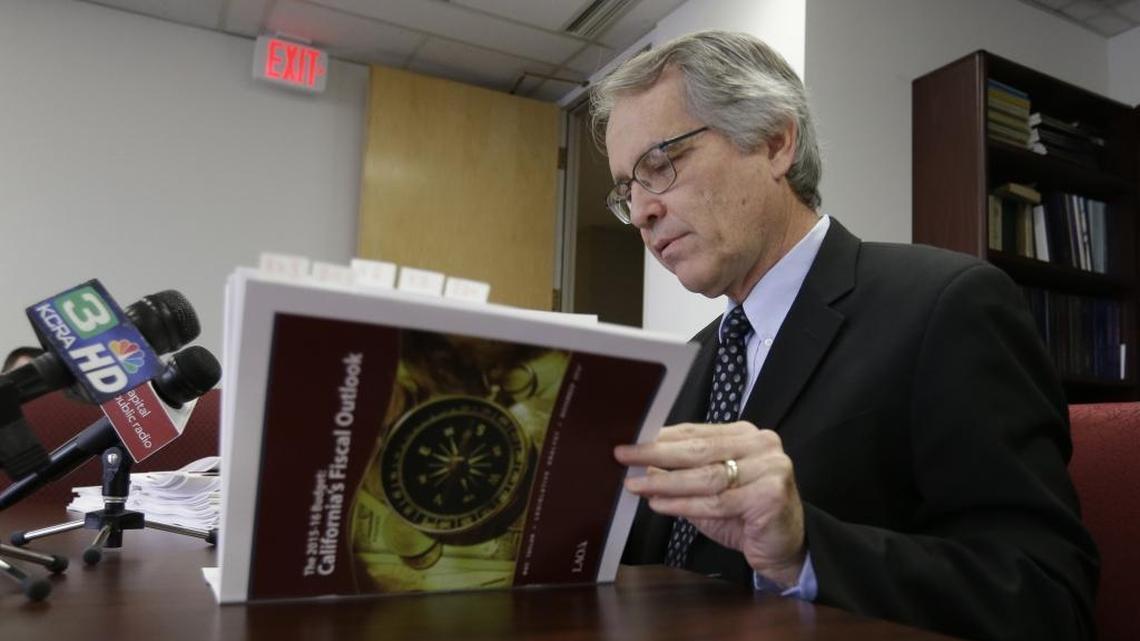 Last November, Legislative Analyst Mac Taylor looks through his office's November 2014 fiscal outlook report. The Legislative Analyst’s Office released its outlook for 2016-17 and beyond Wednesday.