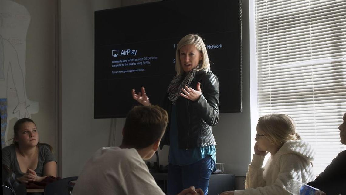 History teacher Emily Holdaway, center, conducts class with the aid of a large screen TV during class at Winston Churchill Middle School in Carmichael on Wednesday, February 10, 2016.