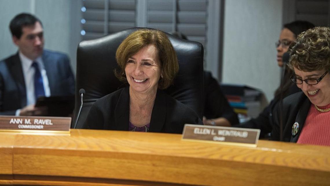 
Federal Election Commissioner Ann Ravel shares a laugh with then-chair Ellen Weintraub before Ravel's first meeting at the commission’s Washington office in October 2013.

