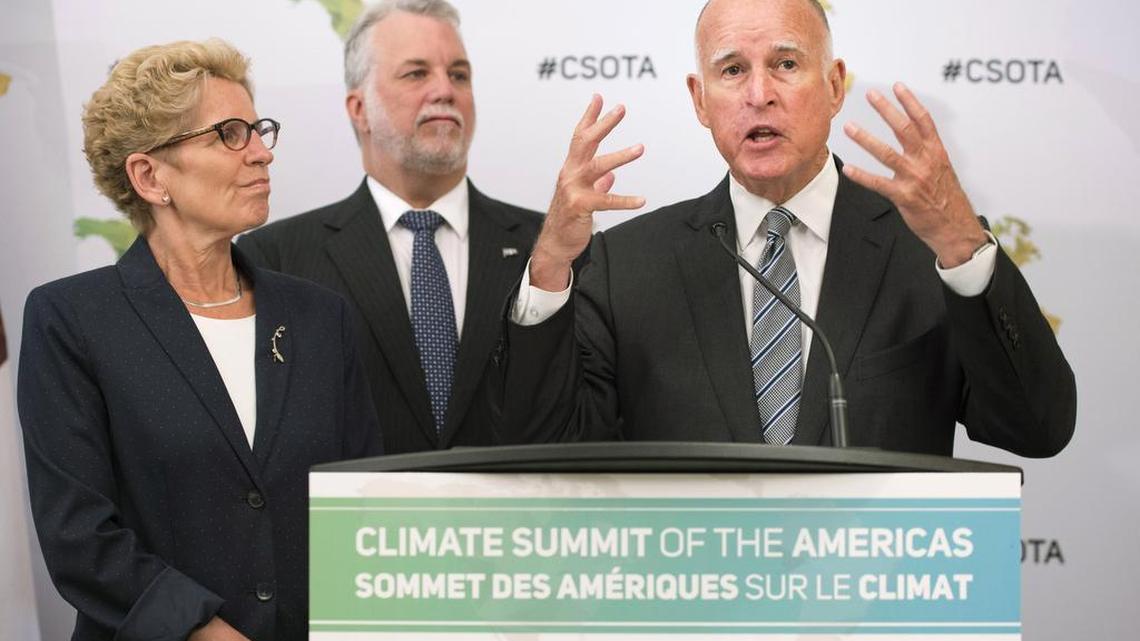 
California Gov. Jerry Brown, right, speaks to reporters with Ontario Premier Kathleen Wynne, left, and Quebec Premier Philippe Couillard at the Climate Summit of the Americas in Toronto on Wednesday, July 8, 2015.
