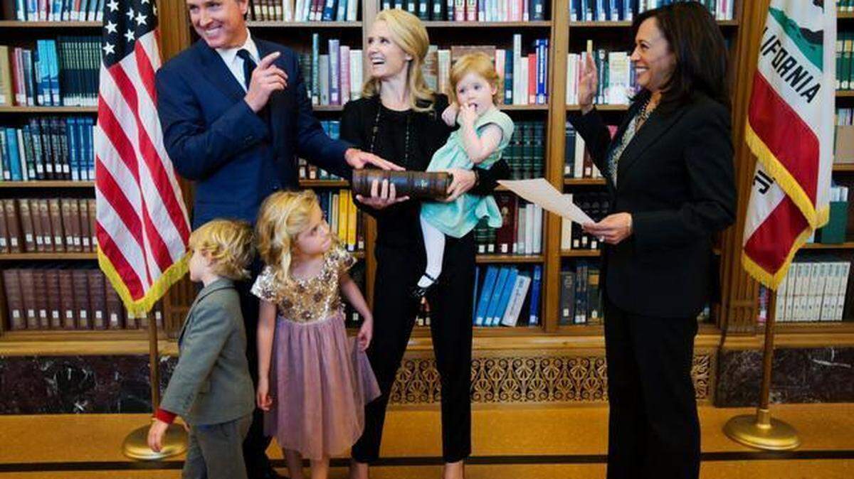 Lt. Gov. Gavin Newsom is sworn into his second term in the office by state Attorney General Kamala Harris on Jan. 5, 2015, in Sacramento. Newsom is joined by his wife, Jennifer Siebel Newsom, and their children Montana, 5, Hunter, 4, and Brooklynn, 2.