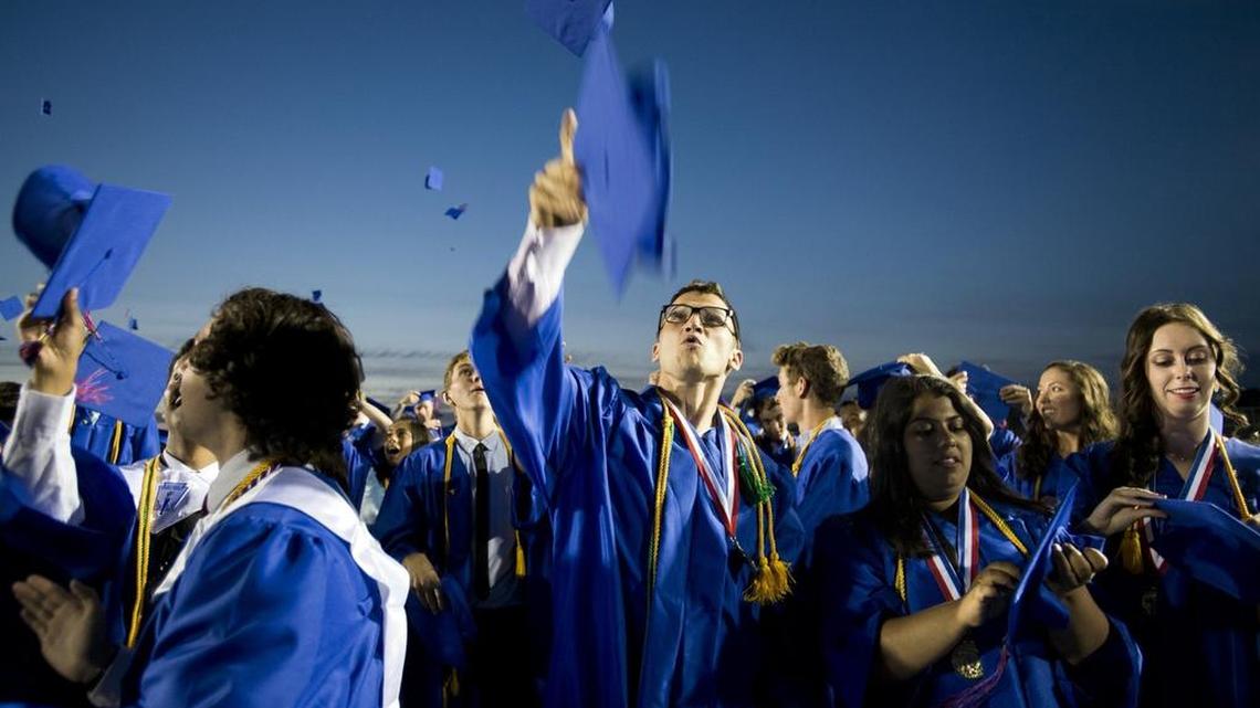 
Lukas Novak, tossed hit hat into the air in celebration during the conclusion of the graduation ceremony at Folsom High School in 2014. The Assembly approved legislation Thursday that gives a reprieve to high school graduates unable to take the exit exam.
