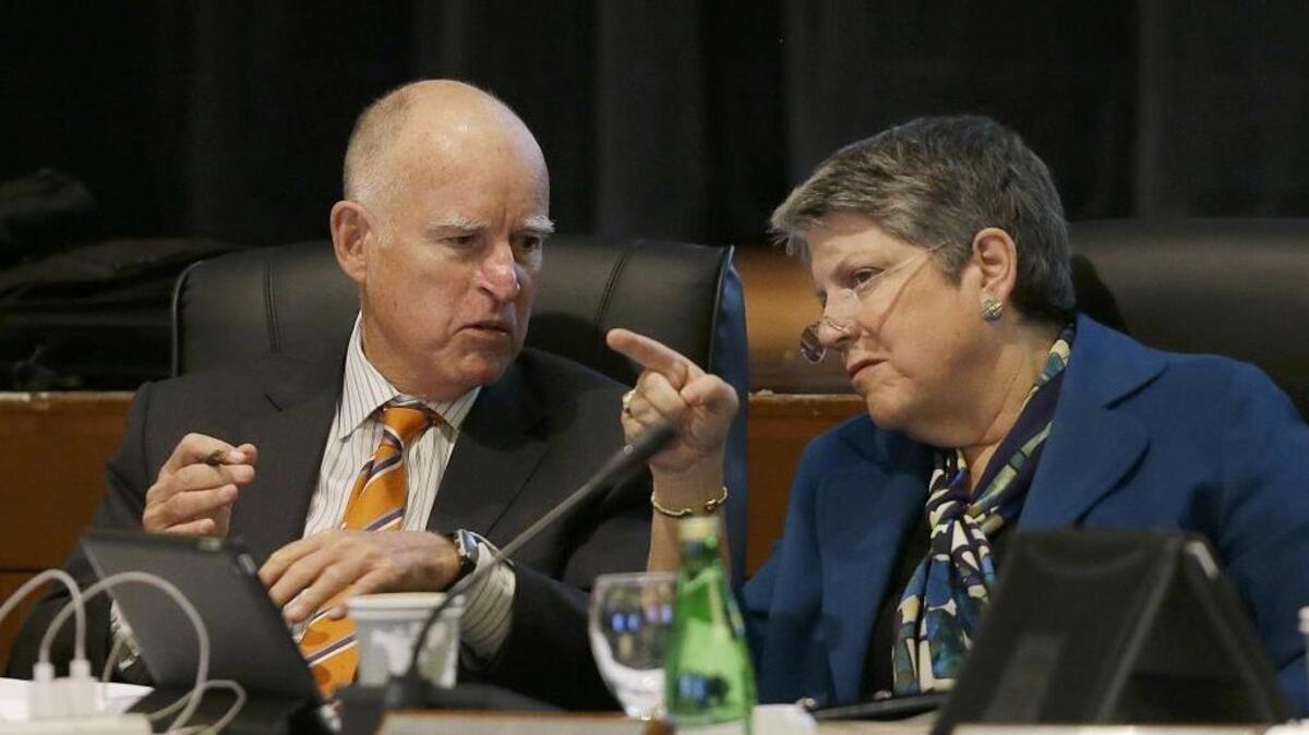 University of California President Janet Napolitano talks with Gov. Jerry Brown during a UC Board of Regents meeting in San Francisco on March 18, 2015.