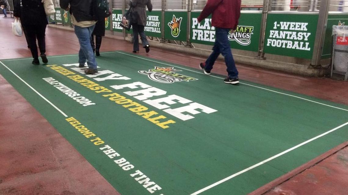 An ad for daily fantasy sports operator DraftKings is displayed in a subway station in Philadelphia.