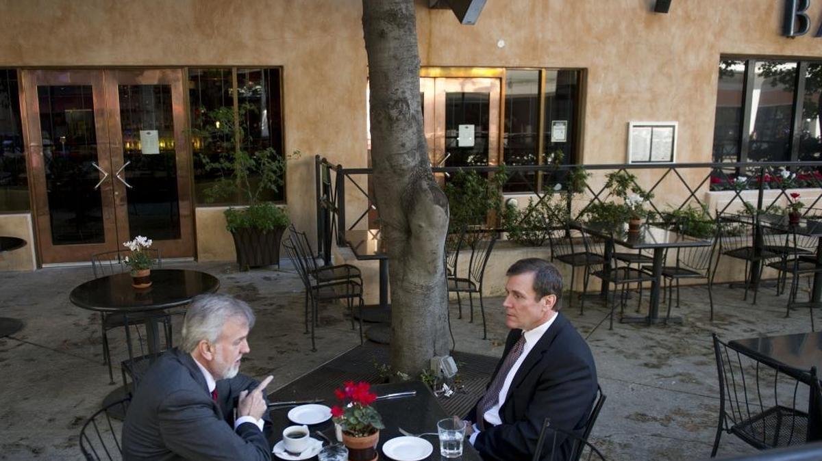 John Bovee, of The Bovee Company, talks with Republican Scott Wilk, who is running Assembly, on Oct. 27, 2011, at Chops in downtown Sacramento.