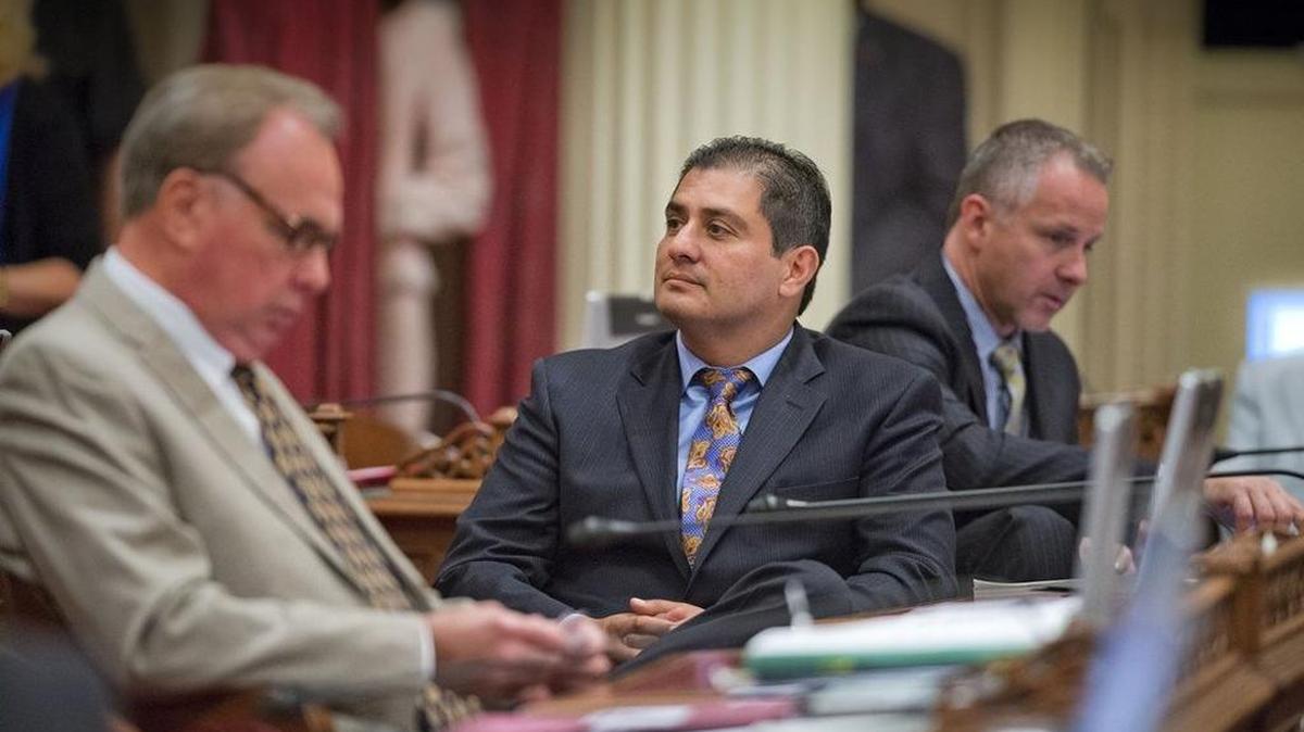 Sen. Ben Hueso, D-San Diego, center, in Sacramento on August 25, 2014.