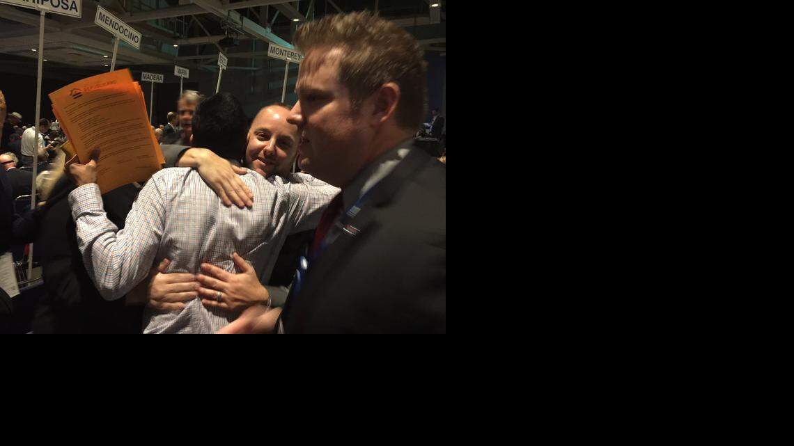 
Leaders of Log Cabin California embrace after the California Republican Party voted to give the club charter status on Sunday.
