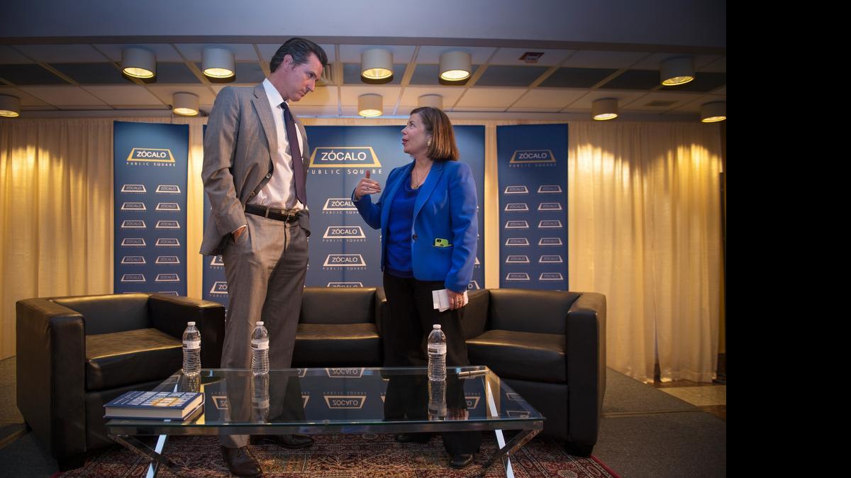 
Sacramento Bee Publisher Cheryl Dell speaks with Lt. Gov. Gavin Newsom, following a discussion that included Arizona State University President Michael M. Crow, on higher education on Monday, May 18, 2015, at the Tsakopoulos Library Galleria in Sacramento.
