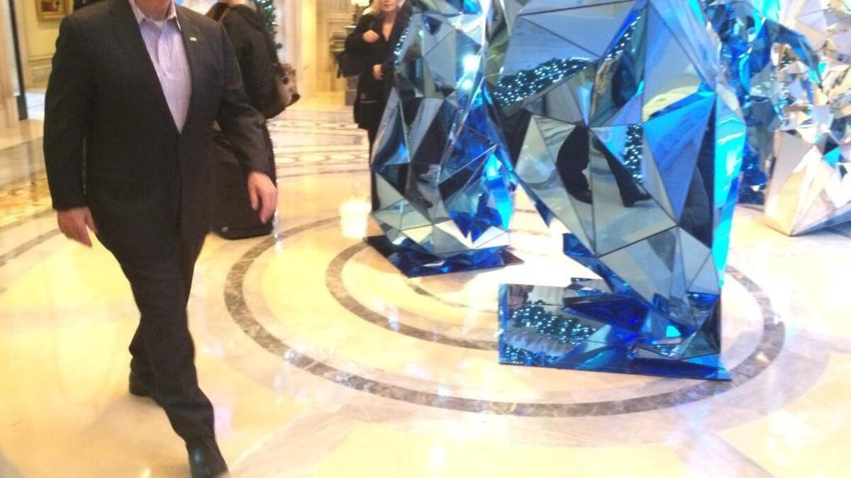 Gov. Jerry Brown arrives at the Four Seasons hotel in Paris to meet with former Gov. Arnold Schwarzenegger on Sunday.